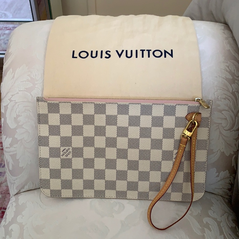 Louis Vuitton Authentic Pouch. New Never Carried!